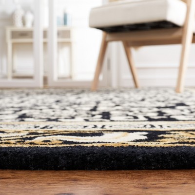 Antiquity Black and Ivory Wool 4' x 6' Hand-Tufted Area Rug