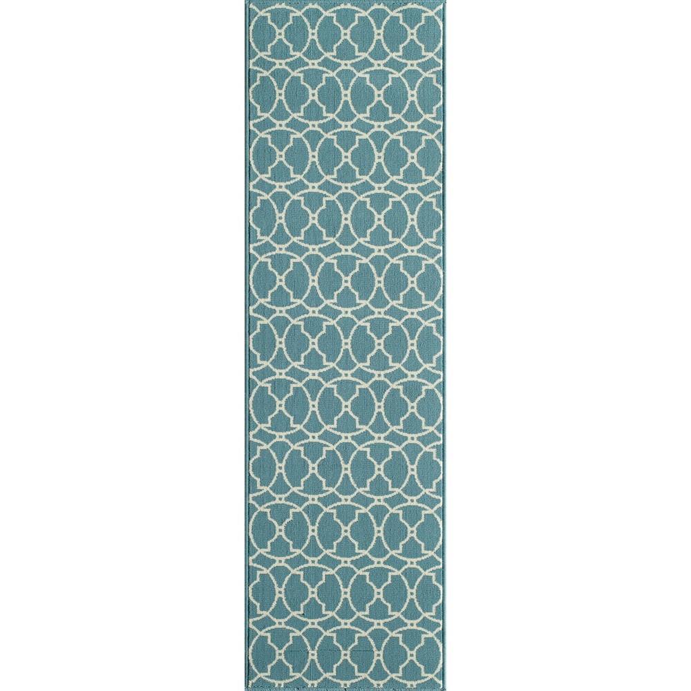 2'3 x8' Runner Blue Indoor/Outdoor Calypso Rug - Momeni This elegant indoor/outdoor all-weather area rug offers everything you need to complete the ultimate outdoor room. Repeating stripes, diamonds, trellis and arabesque shapes meet nautical icons like ropes, anchors and waves, adding a luxe layer to all interior and exterior living spaces, including patios, porches and pool decks. Durable power-loomed construction ensures each decorative floorcovering transitions beautifully from season to season while the vibrant color palette and enduring polypropylene fibers offer endless design possibilities indoors and out. Size: 2'3 X8' RUNNER. Color: Blue. Pattern: Geometric.