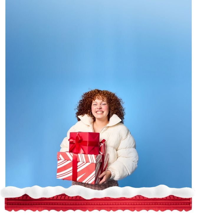 Teen holding gift boxes