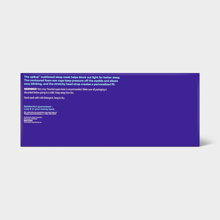 A purple colored box with white text describing a cushioned sleep mask, including features like contoured foam eye cups and a stretchy head strap, along with care instructions and a satisfaction guarantee.