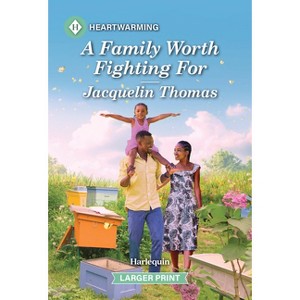 A Family Worth Fighting for - (Polk Island Story) Large Print by  Jacquelin Thomas (Paperback) - 1 of 1