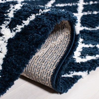Ivory and Navy 8' x 10' Synthetic Shag Area Rug