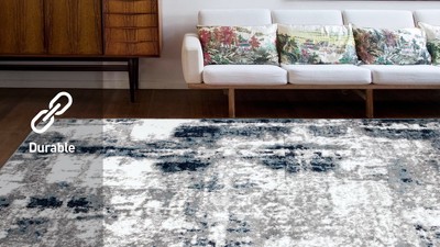 Reversible Blue Abstract Synthetic 5' x 7' Easy-Care Area Rug