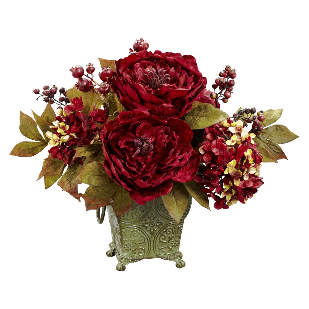 14" Peony & Hydrangea Silk Flower Arrangement - Nearly Natural Introduce you decor to a breathtaking botanical vibe with this Peony and Hydrangea Silk Flower Arrangement from Nearly Natural. The perfect blend of compact size and beautiful holiday color, this floral combination works well to create a festive appeal. Featuring big red blooms, smaller petals and gold-hued leaves that has this arrangement look great wherever you choose to place it. Silk arrangements are manufactured using synthetic materials, such as polyester material or plastic, and are well designed and constructed to be life-like in appearance. This item may need to be re-shaped when removed from the secure box to allow it to reach its fullest size. Your arrangement will look beautiful for years to come; simply wipe clean with a soft dry cloth when needed. Measurements are from the bottom of the container to the furthest extended leaf or branch on the tree. Width dimensions are also calculated from each furthest outstretched dimension. MATERIALS: Polyester material, Iron, Metal, Styrofoam Color: One Color.