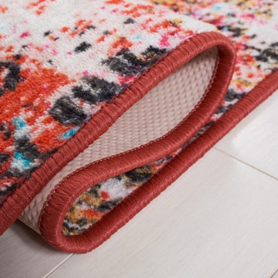 Orange and Light Blue 8' x 10' Synthetic Washable Area Rug