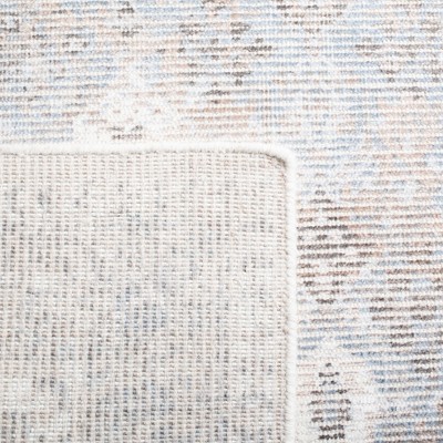 Handmade Tufted Black and Beige Wool Area Rug