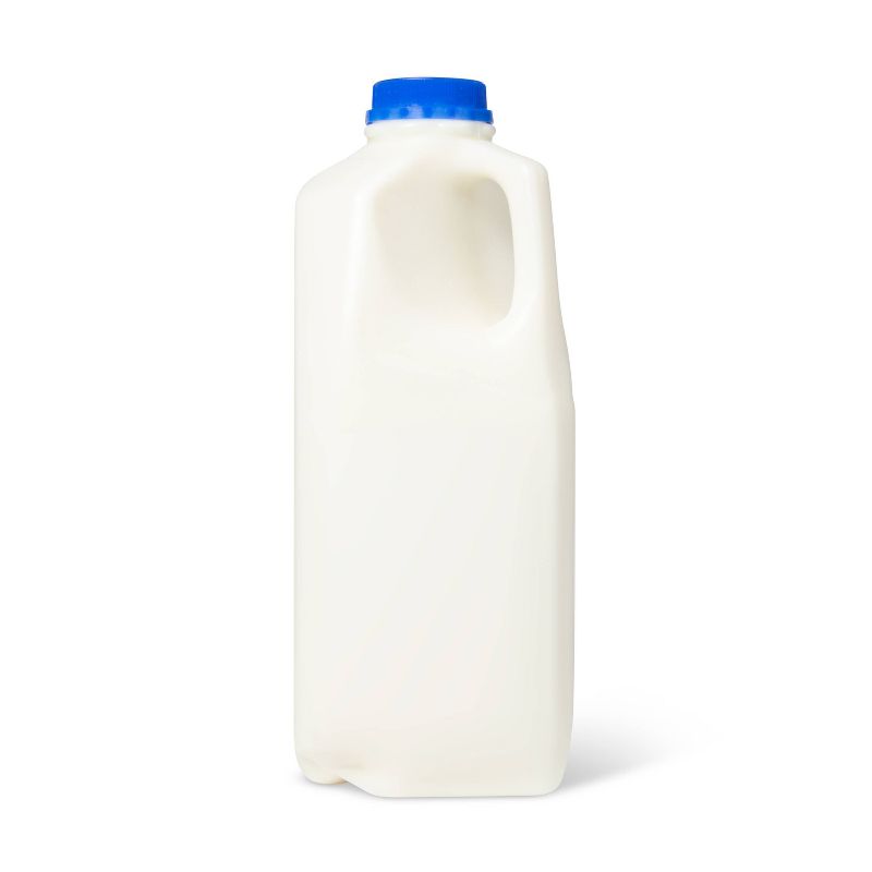A white plastic milk jug with a blue cap.