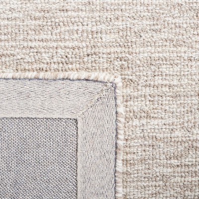 Natural Ivory Handmade Wool Tufted Abstract Rug 5' x 8'