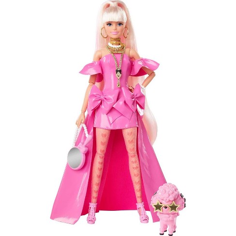 Premium Photo  Barbie and ken dolls in their pink house family