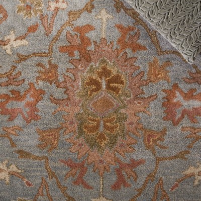 Elegant Heritage Hand-Tufted Wool Round Rug in Light Blue