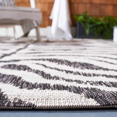Ivory and Black Animal Print Indoor/Outdoor Rug