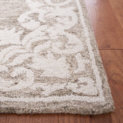 Ivory and Beige Tufted Wool Abstract Area Rug