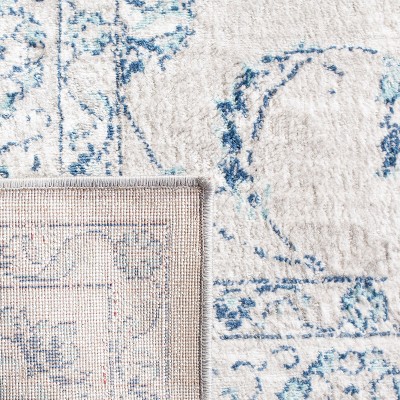 Brentwood 5'3" x 7'6" Blue Synthetic Stain-Resistant Area Rug