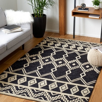 Handmade Black and Ivory Wool Abstract Area Rug
