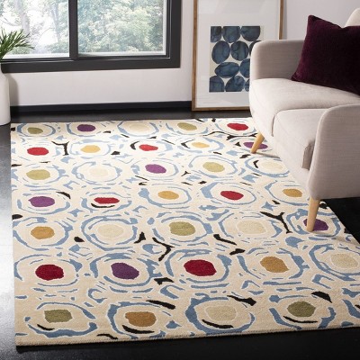 Ivory and Multicolor Handmade Wool Area Rug, 6' x 9'