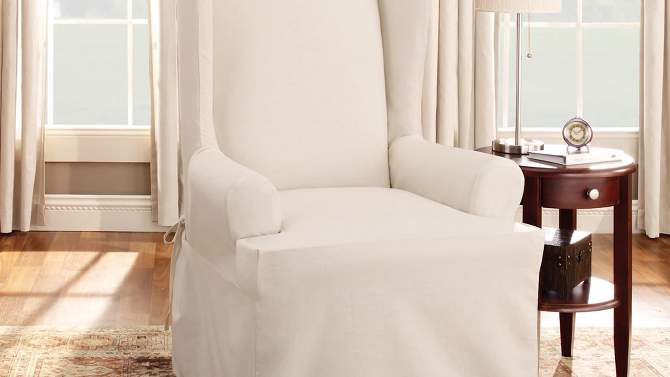 Essential Twill Ruffle Wing Chair Slipcover White - Sure Fit, 2 of 5, play video