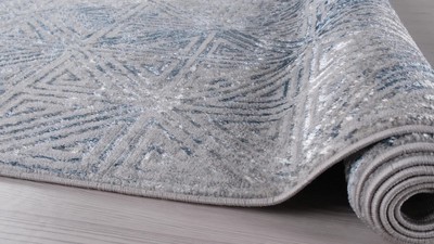Blue Geometric 5' x 7' Stain-Resistant Synthetic Area Rug