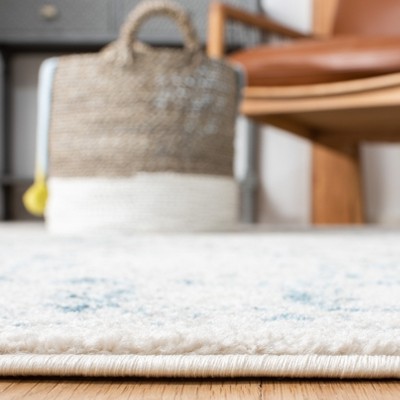 Ivory and Teal Hand-knotted Round Synthetic Area Rug