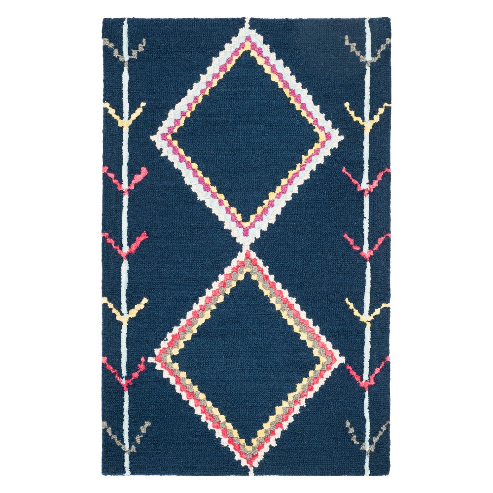 2'6inx4' Geometric Tufted Accent Rug Navy - Safavieh