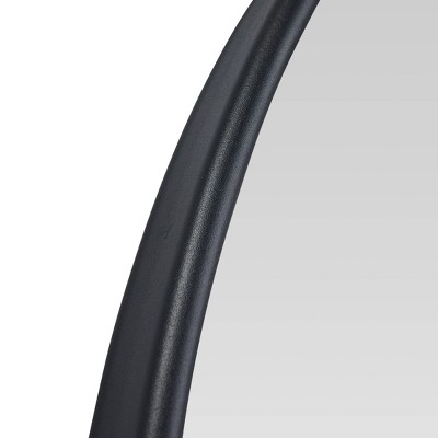 Black Metal Arched Wall Mirror with Sleek Frame