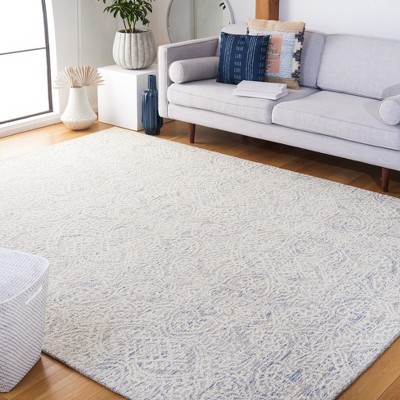 Light Blue and Ivory Floral Wool 8' x 10' Handmade Tufted Rug