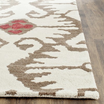 Ivory and Brown Handmade Wool 6' x 9' Reversible Area Rug