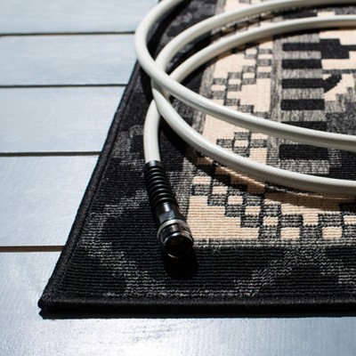 Black and Beige Round Synthetic Indoor/Outdoor Rug
