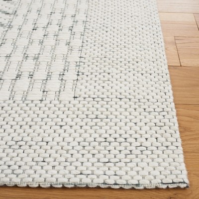 Ivory and Green Handwoven Wool 6' x 9' Area Rug