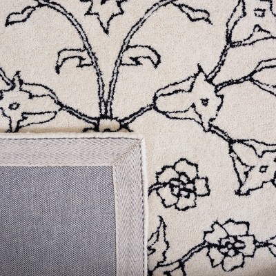 Ivory and Black Hand-Tufted Wool 8' x 10' Area Rug