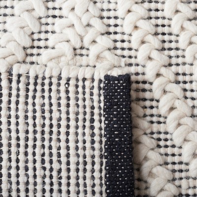 Handmade Black and Ivory Wool Tufted Square Rug