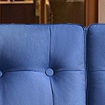 blue cushion/brown wicker