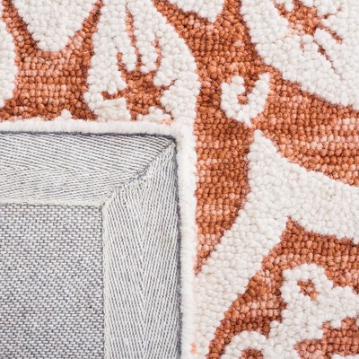 Ivory and Pink Floral Hand Tufted Wool Area Rug 8' x 10'