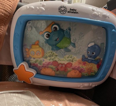 Baby Einstein Sea Dreams Soother (My son's first reaction to it) 