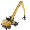 CAT Caterpillar MH3040 Wheel Material Handler with Operator "High Line Series" 1/50 Diecast Model by Diecast Masters - 4 of 4