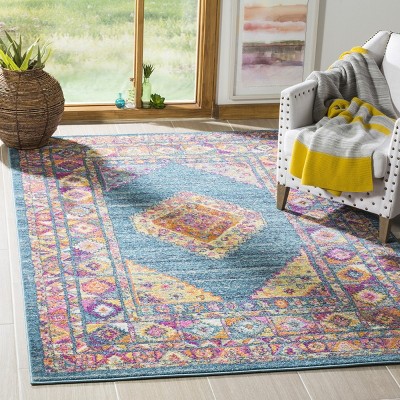 Light Blue and Orange Synthetic Easy Care Area Rug, 6' x 9'