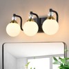 PAKOKULA 3-Light Black and Gold Vanity Light with Globe White Frosted Glass Shade - 2 of 4