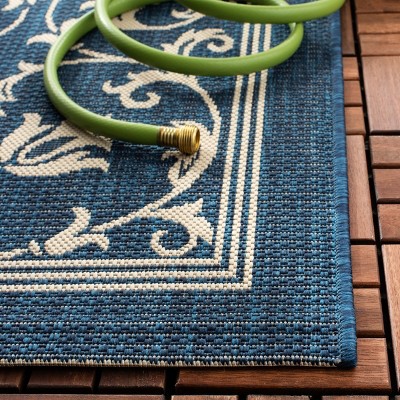 Navy and Beige Rectangular Synthetic Indoor/Outdoor Rug