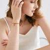 Free bird Cross Birthstone Bracelet | Dainty 14K Gold Plated Cross Charm Bracelet | Stretchable Elastic Gold Beaded Bracelet - 3 of 4