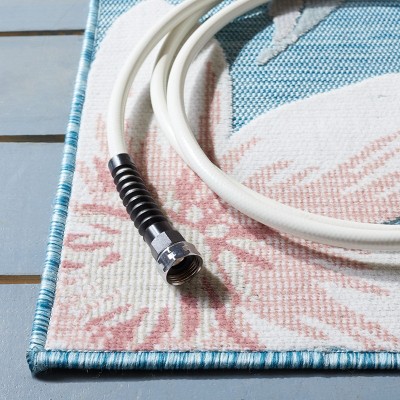 Aqua and Rust Floral Synthetic 4' x 6' Reversible Area Rug
