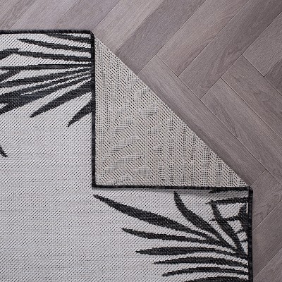 Black and Gray Synthetic Floral Flat Woven Runner Rug 2' x 7'