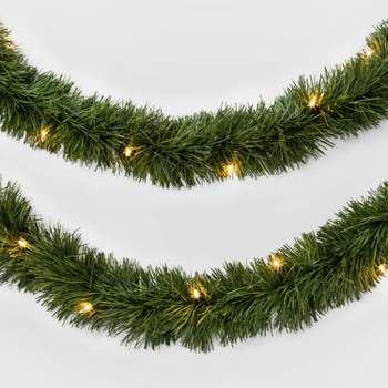 18' Pre-Lit Artificial Pine Christmas Garland Green with Clear Lights - Wondershop™