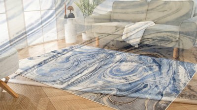 Blue and White Abstract Swirl 5' x 7' Synthetic Area Rug