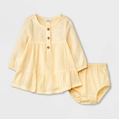Baby Girls' Solid Long Sleeve Dress - Cat & Jack™ Cream 3-6M