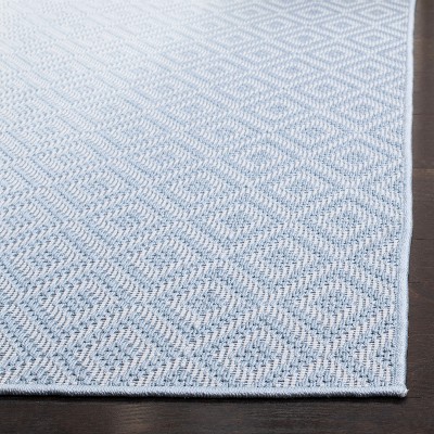 Light Blue Geometric Synthetic Indoor/Outdoor Area Rug