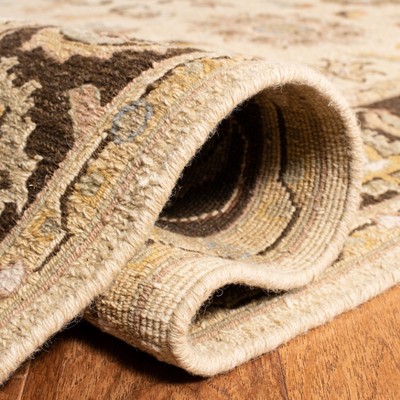 Ivory and Brown 6' x 9' Handwoven Wool Area Rug