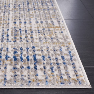 Beige and Blue Abstract Synthetic Area Rug
