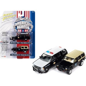 1997 Chevrolet Tahoe Black and White and Jeep Cherokee XJ Black w/Tan 1/64 Diecast Model Cars by Johnny Lightning - 1 of 3