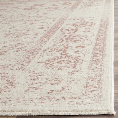 Oversized Ivory and Rose Synthetic Area Rug, 11' x 15'
