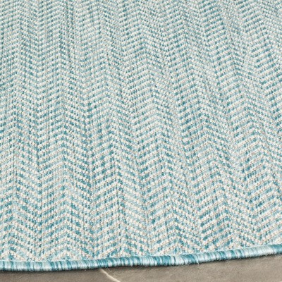 Courtyard 59'' Round Gray Synthetic Easy-Care Indoor/Outdoor Rug