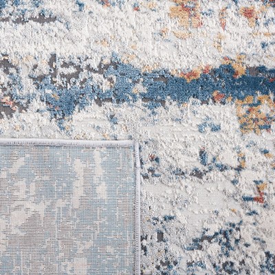 Ivory Abstract Braided 24" Synthetic Reversible Rug